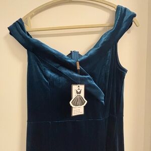 Blue jewel tone velvet dress. Ready for the holiday family or office party.
